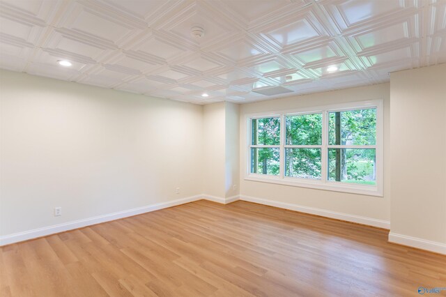 empty room with light hardwood / wood-style floors