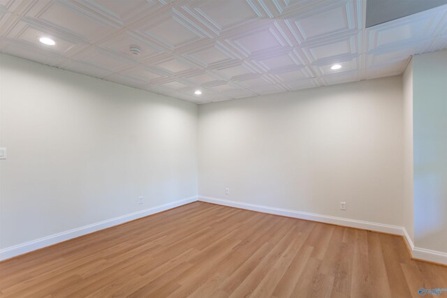 spare room featuring light wood-type flooring