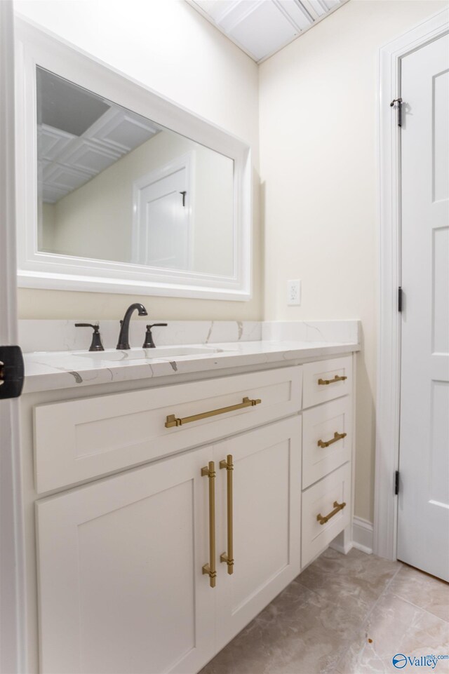 bathroom featuring vanity and tile patterned flooring