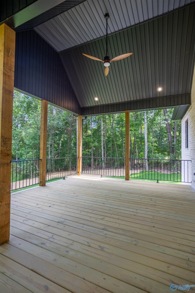 wooden deck featuring ceiling fan