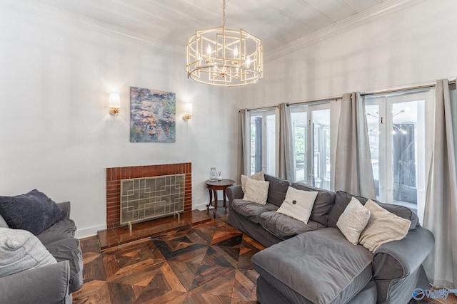 living room with dark parquet floors, crown molding, and a chandelier