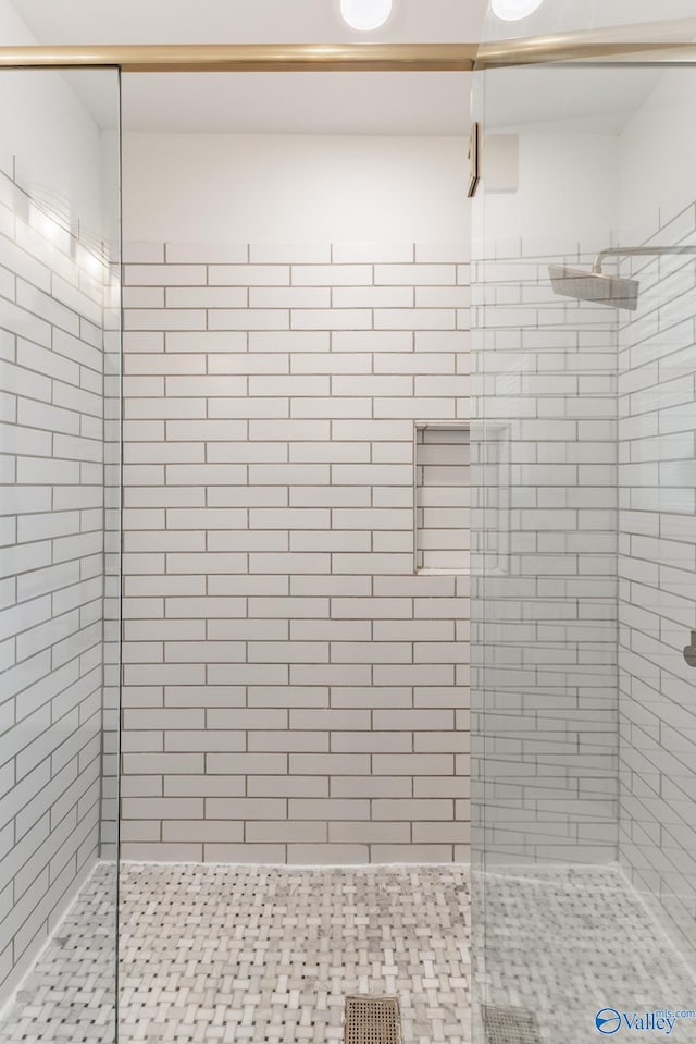 bathroom featuring walk in shower