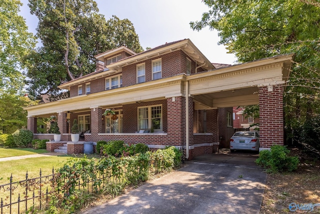 view of front facade featuring a carport and covered porch