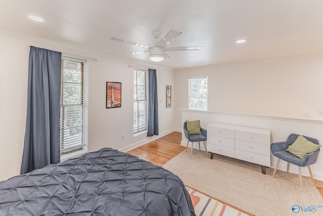 bedroom featuring recessed lighting, baseboards, ceiling fan, and wood finished floors