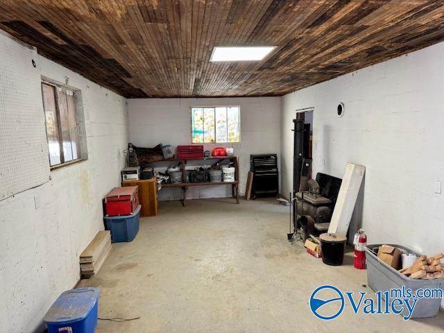 basement featuring wood ceiling