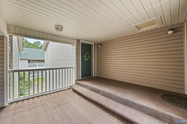 unfurnished sunroom with a wealth of natural light