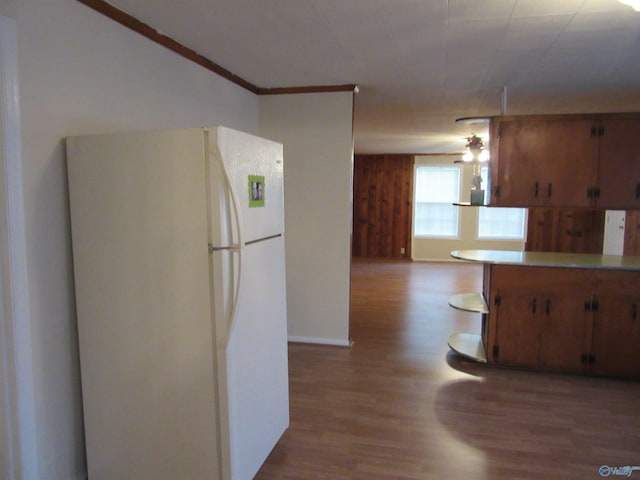 3201 Holmes Ave, Huntsville, AL 35816 - kitchen featuring freestanding refrigerator, wood finished floors, and light countertops