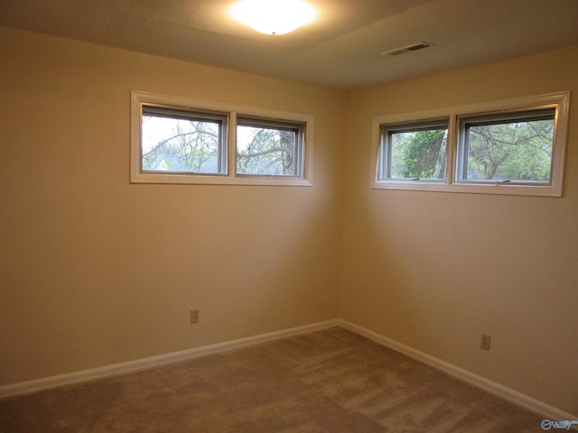 3201 Holmes Ave, Huntsville, AL 35816 - empty room with baseboards and carpet floors
