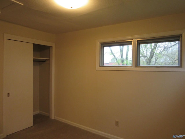 3201 Holmes Ave, Huntsville, AL 35816 - unfurnished bedroom featuring a closet and baseboards