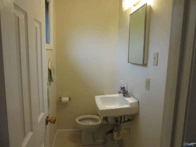 3201 Holmes Ave, Huntsville, AL 35816 - bathroom featuring toilet and tile patterned floors