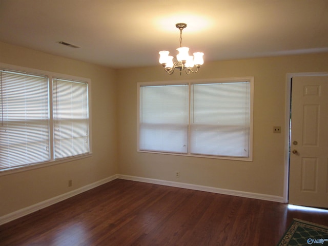 3201 Holmes Ave, Huntsville, AL 35816 - entryway with a chandelier and dark wood-style floors