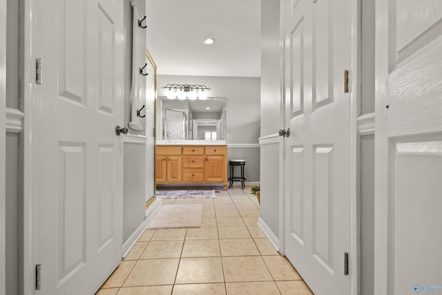 bathroom with vanity and tile patterned floors