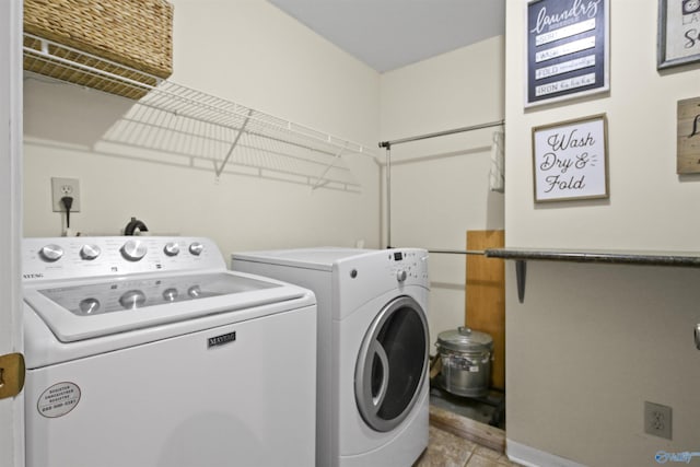 laundry area with washer and clothes dryer