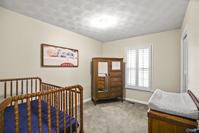 bedroom with light colored carpet