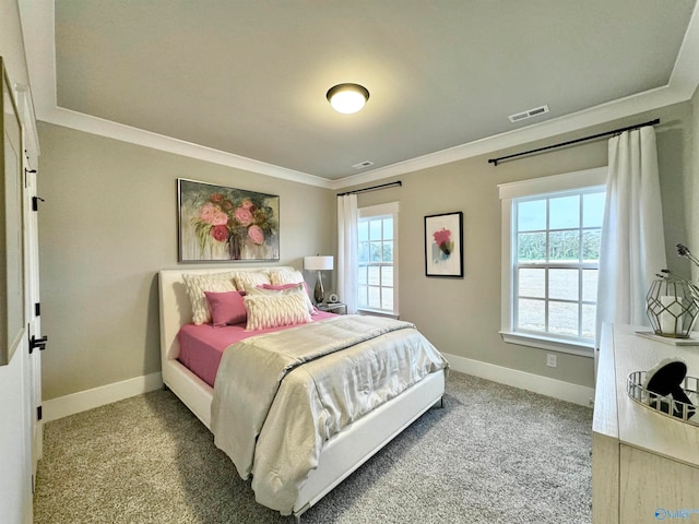 bedroom featuring light colored carpet, crown molding, and multiple windows