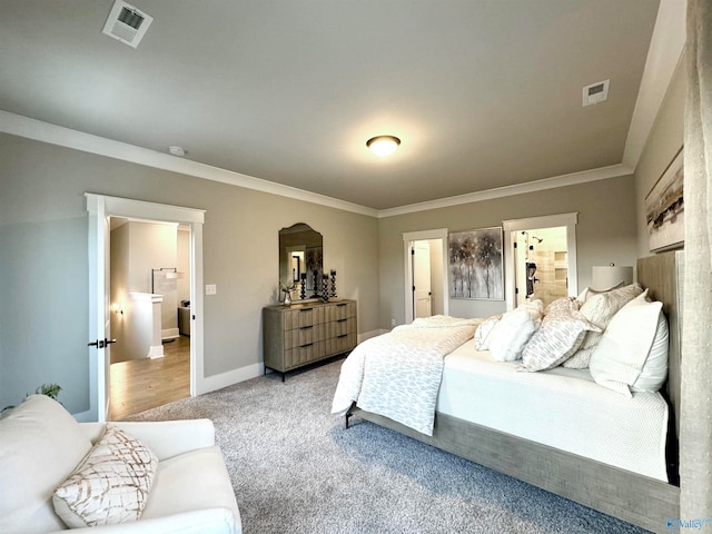 bedroom featuring crown molding and light carpet