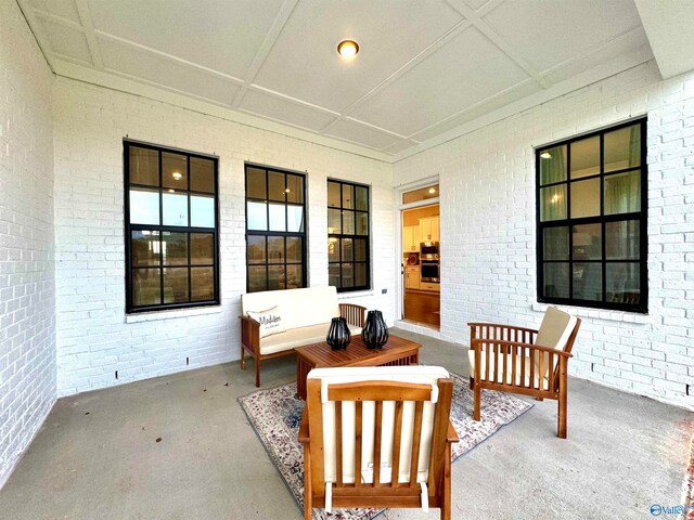 view of patio featuring covered porch and an outdoor hangout area