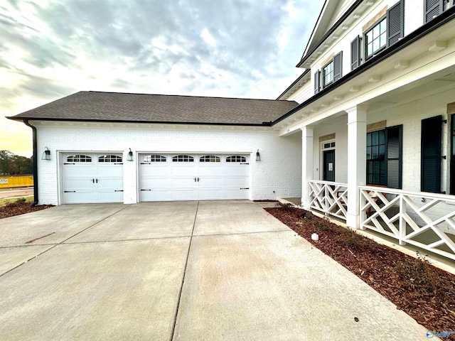 view of property exterior with a garage