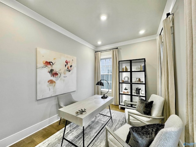 home office with crown molding and hardwood / wood-style floors