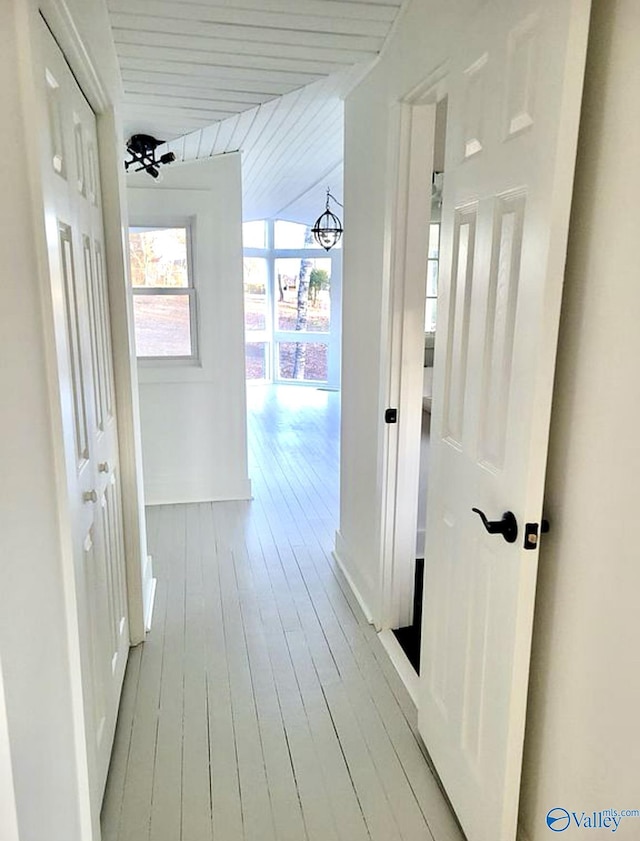 3635 Buck Island Dr, Guntersville, AL 35976 - corridor featuring a chandelier, hardwood / wood-style floors, and wood ceiling