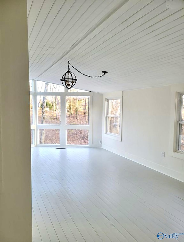 3635 Buck Island Dr, Guntersville, AL 35976 - unfurnished sunroom with a chandelier
