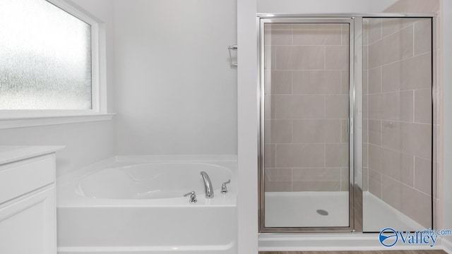 307 Wraywood Rd, Huntsville, AL 35810 - bathroom with a stall shower, a garden tub, and vanity