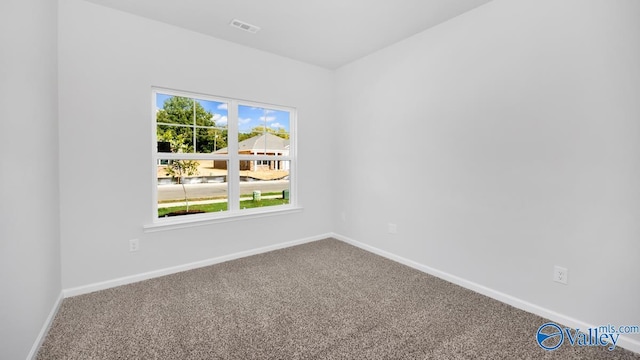 307 Wraywood Rd, Huntsville, AL 35810 - spare room with carpet flooring and baseboards