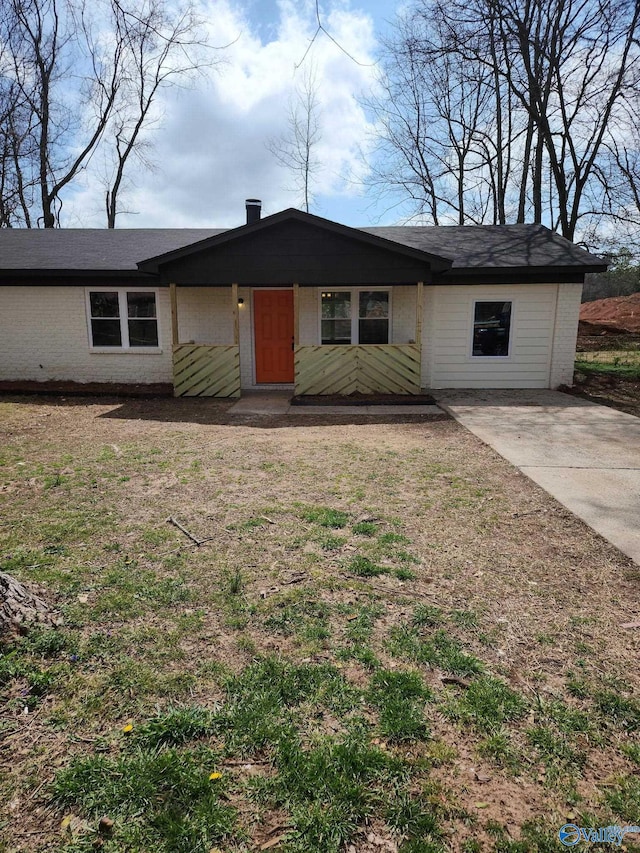 view of front of house with brick siding