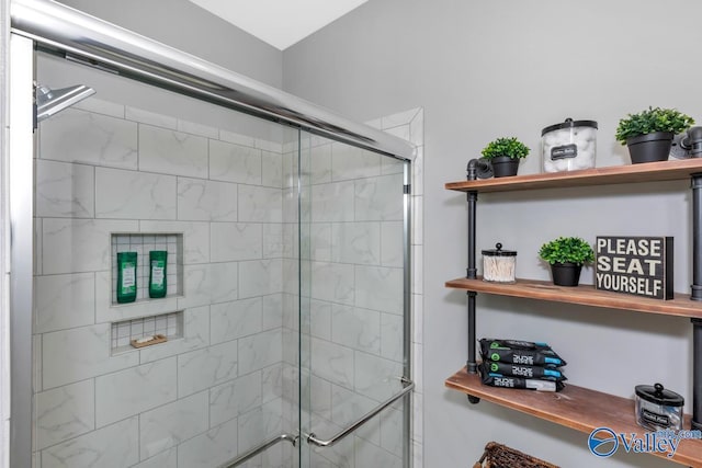 full bathroom featuring a shower stall