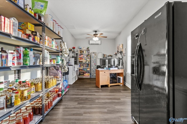 pantry with a wall mounted AC