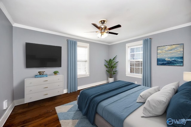 bedroom featuring ornamental molding, ceiling fan, baseboards, and wood finished floors