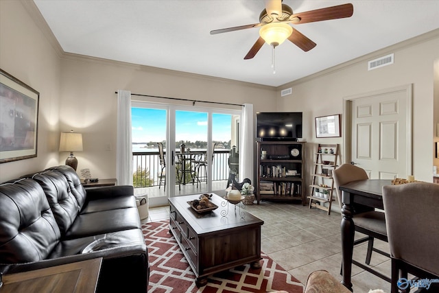 12100 Two Rivers Dr Phi, Phi, Athens, AL 35611 - living area featuring a ceiling fan, crown molding, and light tile patterned flooring
