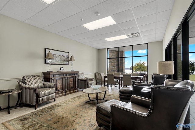 12100 Two Rivers Dr Phi, Phi, Athens, AL 35611 - tiled living area with a drop ceiling and a wall of windows