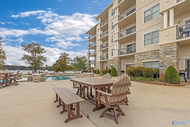 12100 Two Rivers Dr Phi, Phi, Athens, AL 35611 - view of patio / terrace featuring a community pool
