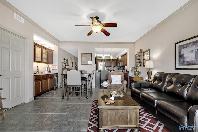 12100 Two Rivers Dr Phi, Phi, Athens, AL 35611 - living room with a ceiling fan, ornamental molding, and dark tile patterned flooring