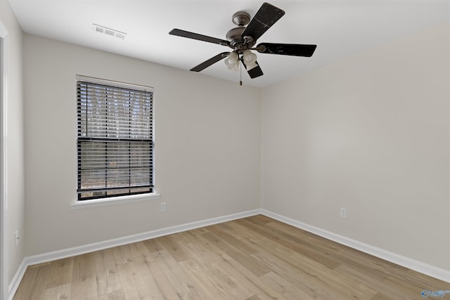 spare room featuring ceiling fan and light hardwood / wood-style floors