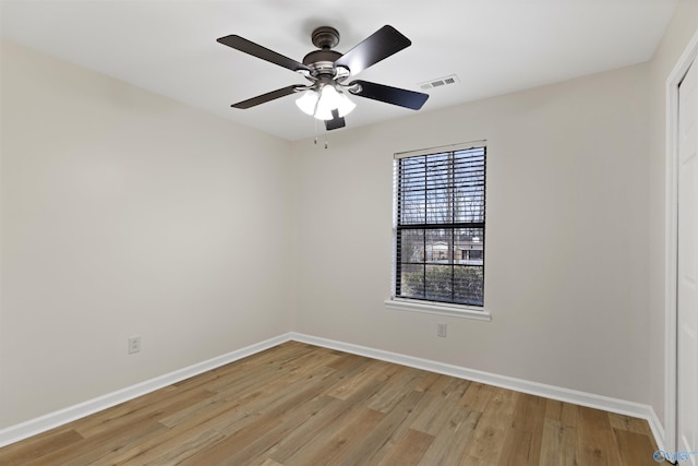 unfurnished room with light hardwood / wood-style flooring and ceiling fan