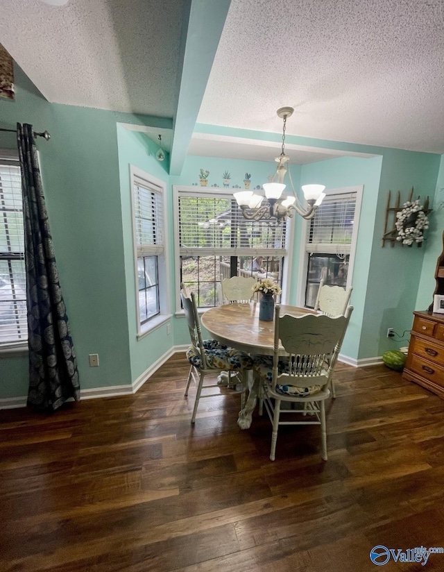1055 Georgia Mountain Rd, Guntersville, AL 35976 - dining room with a textured ceiling, a chandelier, wood finished floors, and baseboards