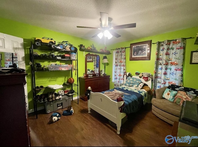 1055 Georgia Mountain Rd, Guntersville, AL 35976 - bedroom featuring wood finished floors, a textured ceiling, and ceiling fan