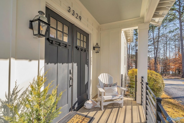 doorway to property with a porch