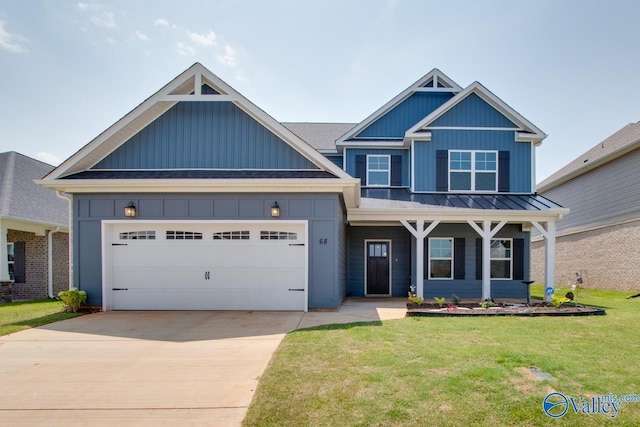 craftsman-style home with a front lawn and a garage