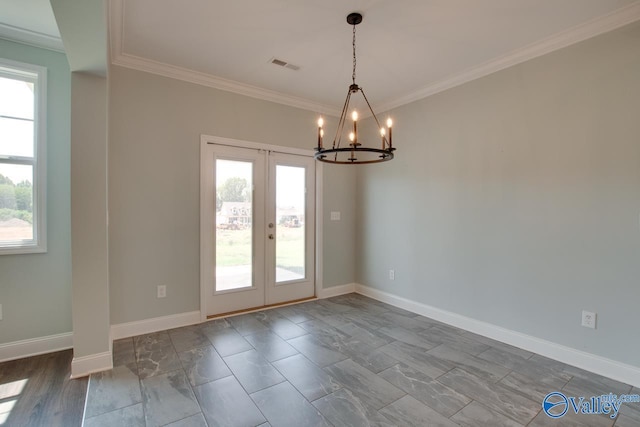 interior space featuring french doors, a wealth of natural light, and ornamental molding