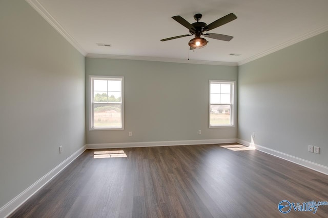 unfurnished room with dark hardwood / wood-style flooring, plenty of natural light, and crown molding