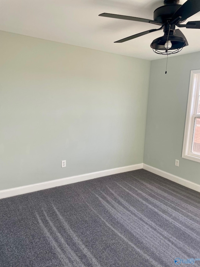 empty room with carpet floors and ceiling fan