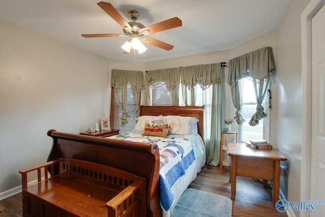 bedroom featuring wood-type flooring and ceiling fan