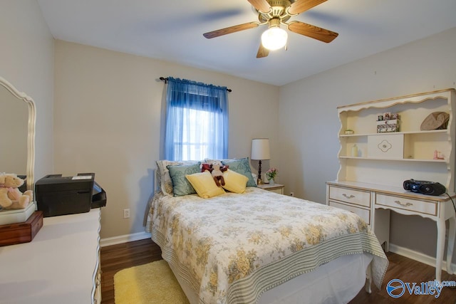 bedroom featuring ceiling fan and dark hardwood / wood-style flooring