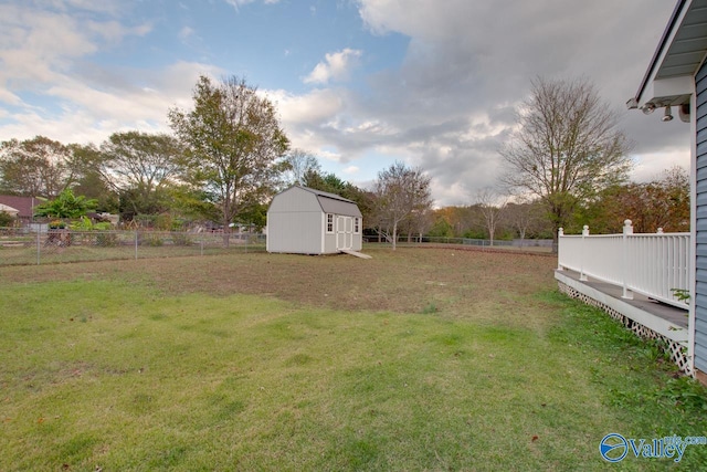 view of yard with a storage unit