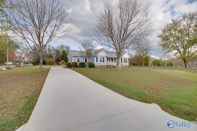 view of front of home with a front lawn