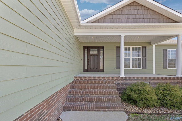 property entrance with a porch