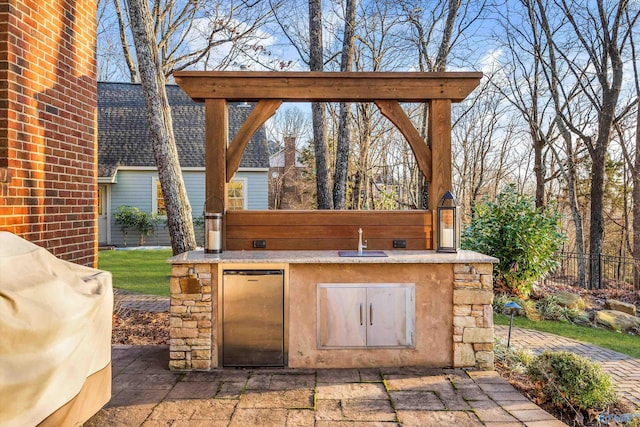 13032 Monte Vedra Rd, Huntsville, AL 35803 - view of patio / terrace with fence, a sink, and area for grilling